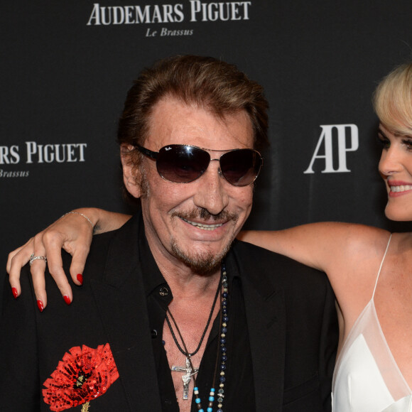 Exclusif - Johnny Hallyday et sa femme Laeticia Hallyday - La maison Audemars Piguet a célébré le lancement de la nouvelle Millenary Femme au Carreau du Temple à Paris le 6 juillet 2015 . Pour la première fois , Audemars Piguet dévoile le coeur de la montre aux prestigieux invités de la soirée. La Millenary est une montre qui rassemble toutes les qualités d'un produit hors norme : Le rigueur des ingénieurs et la sensibilité des designers. Un dîner haut de gamme , à l'image de la soirée a été préparé par le chef Hélène Darroze, suivi d'un concert privé des She Keeps Bees. 
