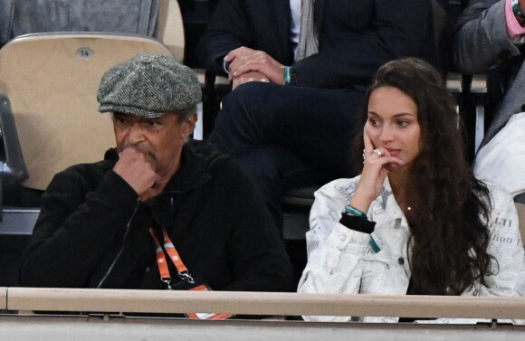 Yannick Noah et sa fille Jenaye Noah - Célébrités dans les tribunes des internationaux de France de Roland Garros à Paris le 30 mai 2022. 