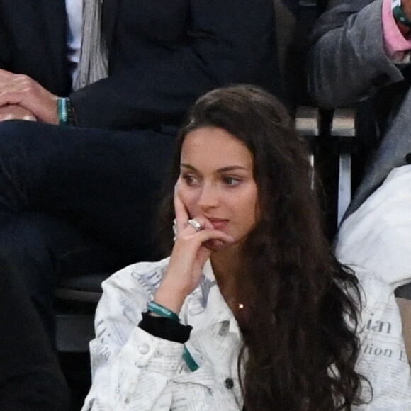 Yannick Noah et sa fille Jenaye Noah - Célébrités dans les tribunes des internationaux de France de Roland Garros à Paris le 30 mai 2022. 