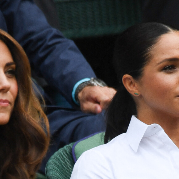 Archives - Catherine (Kate) Middleton, duchesse de Cambridge, Meghan Markle, duchesse de Sussex, sont dans les tribunes lors de la finale femme de Wimbledon "Serena Williams - Simona Halep (2/6 - 2/6) à Londres le 13 juillet 2019. © Chryslène Caillaud / Panoramic / Bestimage 