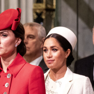 Catherine Kate Middleton, duchesse de Cambridge, Meghan Markle, enceinte, duchesse de Sussex lors de la messe en l'honneur de la journée du Commonwealth à l'abbaye de Westminster à Londres le 11 mars 2019. 