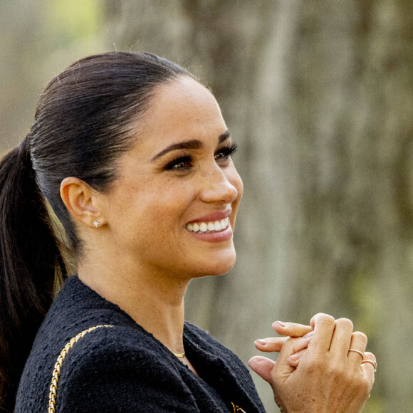 Le prince Harry et Meghan Markle lors du "Land Rover Challenge" au premier jour des Invictus Games 2020 à La Haye, le 16 avril 2022. 