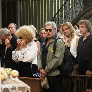 Gérard Lanvin, le chanteur Cali et sa compagne Caroline Chevreux, Anthony Delon - Obsèques de Dani en la cathédrale Saint Jean-Baptiste de Perpignan, le 26 juillet 2022.