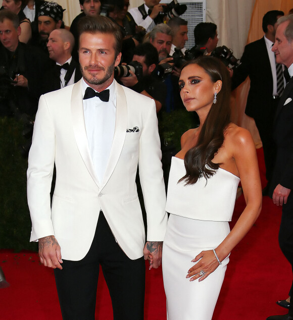 David Beckham et sa femme Victoria Beckham - Soirée du Met Ball / Costume Institute Gala 2014: "Charles James: Beyond Fashion" à New York le 5 mai 2014. 