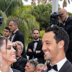 Iris Mittenaere et son compagnon Diego El Glaoui - Montée des marches du film " Top Gun : Maverick " lors du 75ème Festival International du Film de Cannes. Le 18 mai 2022 © Olivier Borde / Bestimage 