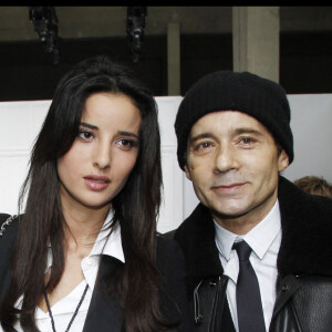 Jean-Luc Delarue et Anissa Khel au défilé Dior Homme le 21 janvier 2012.