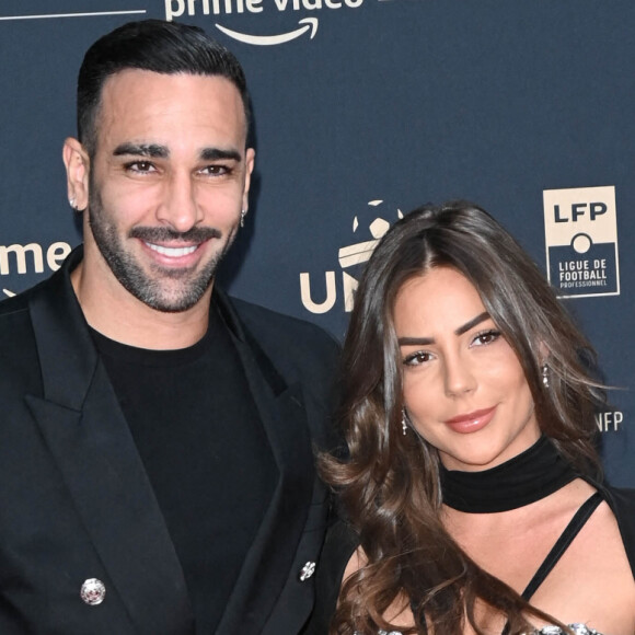 Adil Rami et sa compagne Léna Guillou - Photocall de la cérémonie des Trophées UNFP au Pavillon Gabriel à Paris. © Coadic Guirec/Bestimage