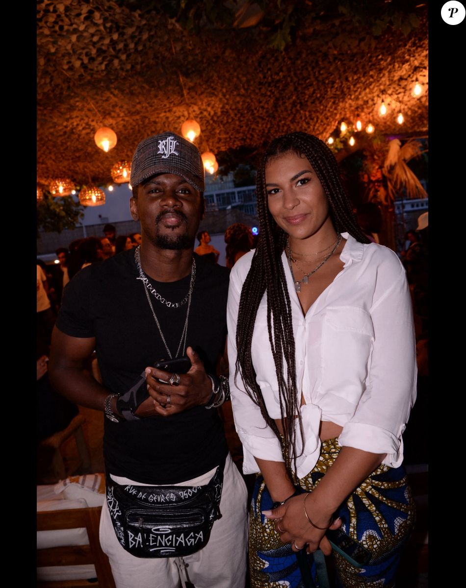 Black M (Alpha Diallo) et sa femme Léa Djadja sur la terrasse éphémère "Barbanegra" à Paris, le 6 juillet 2021. © Rachid Bellak/Bestimage