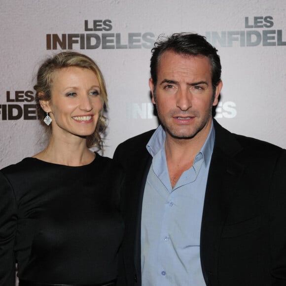 Alexandra Lamy et Jean Dujardin lors de l'avant-premiere des Infideles a Paris.