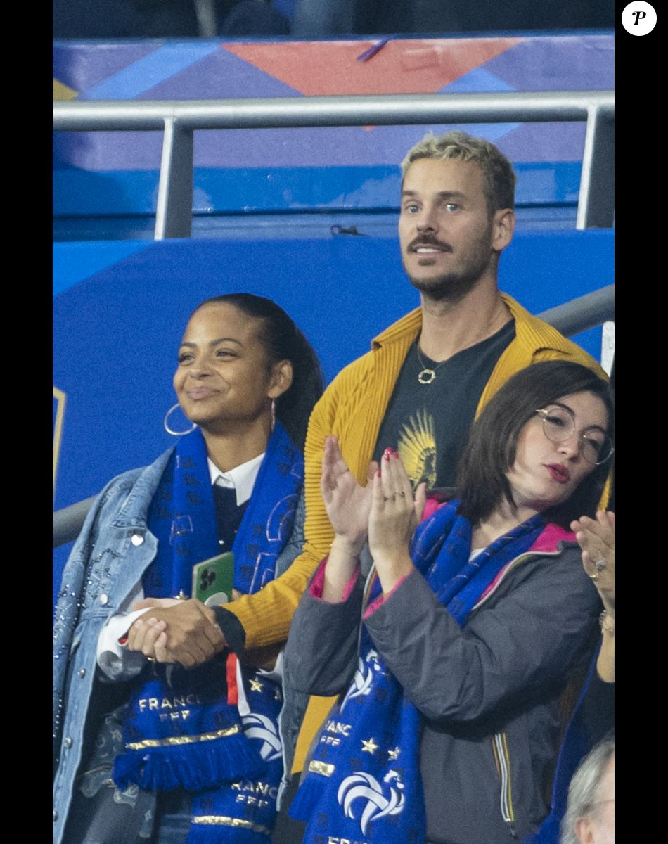 M. Pokora et sa femme Christina Milian - 5e et avant-dernière journée de la Ligue des nations entre la France et l'Autriche au Stade de France à Saint-Denis. Le 22 septembre 2022.