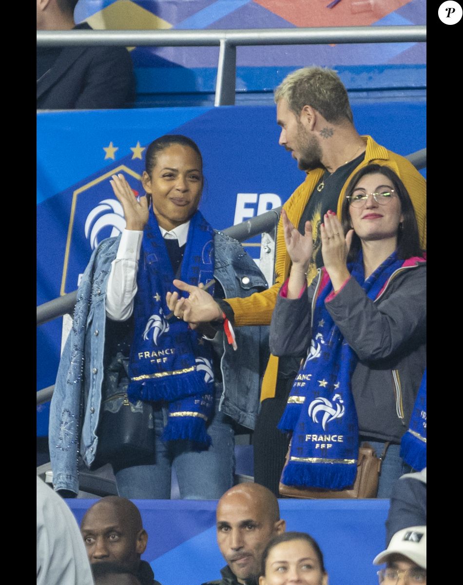 M. Pokora et sa femme Christina Milian - 5e et avant-dernière journée de la Ligue des nations entre la France et l'Autriche au Stade de France à Saint-Denis. Le 22 septembre 2022.
