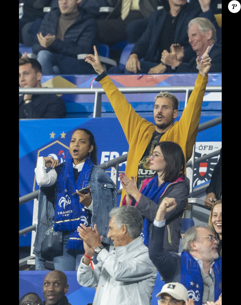 M. Pokora et sa femme Christina Milian - 5e et avant-dernière journée de la Ligue des nations entre la France et l'Autriche au Stade de France à Saint-Denis. Le 22 septembre 2022.