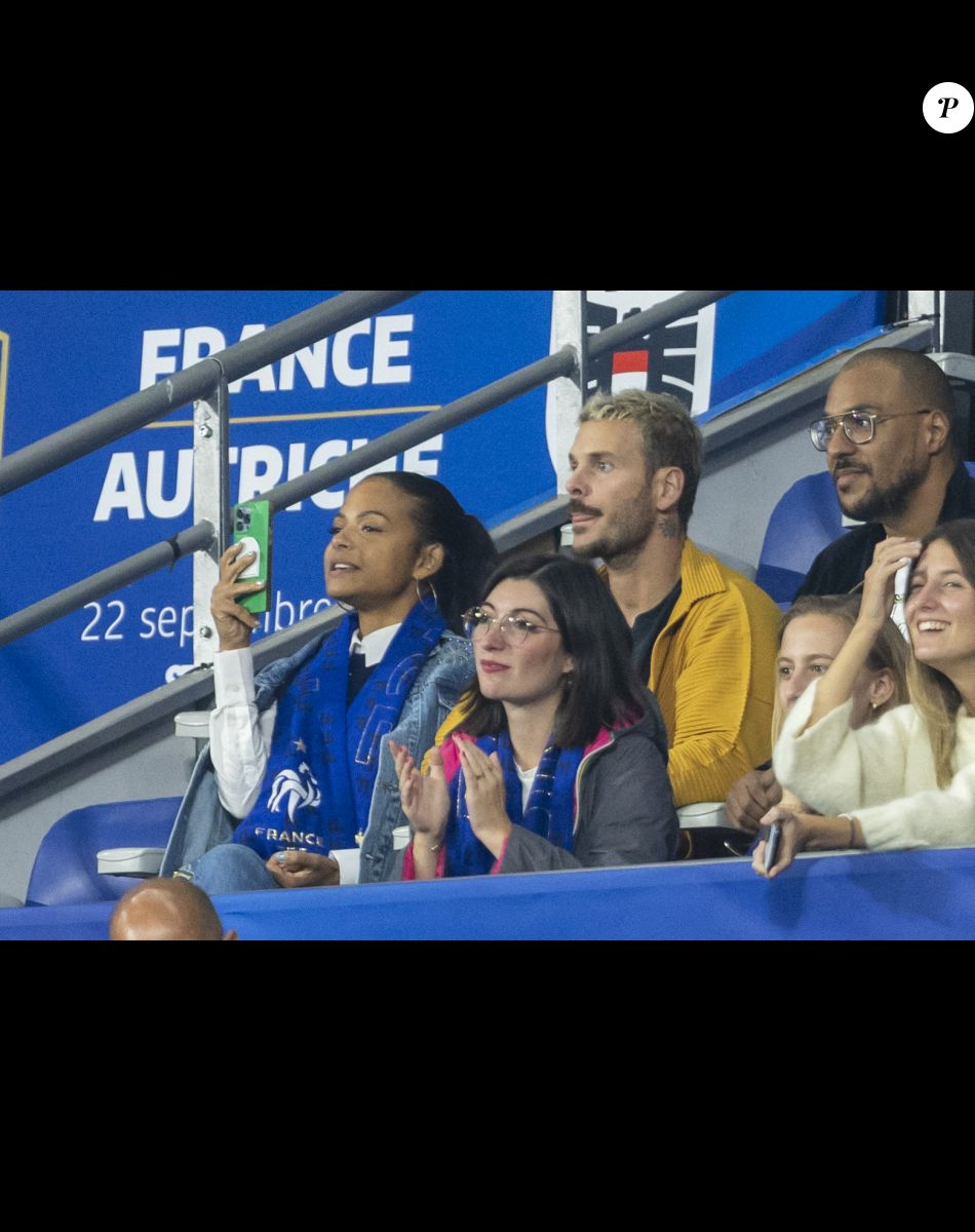 M. Pokora et sa femme Christina Milian - 5e et avant-dernière journée de la Ligue des nations entre la France et l'Autriche au Stade de France à Saint-Denis. Le 22 septembre 2022.