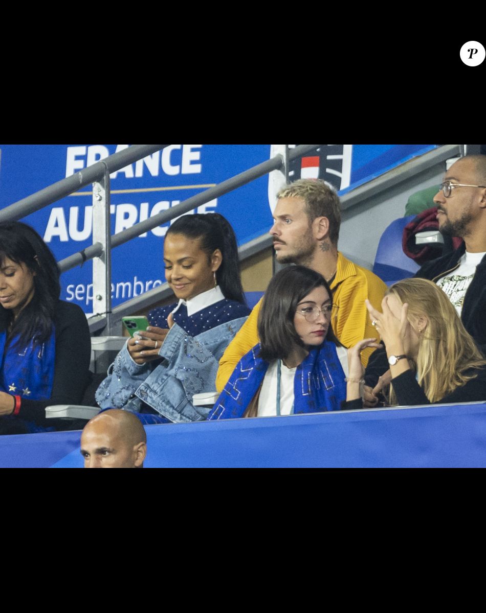 M. Pokora et sa femme Christina Milian - 5e et avant-dernière journée de la Ligue des nations entre la France et l'Autriche au Stade de France à Saint-Denis. Le 22 septembre 2022.