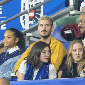 M. Pokora et sa femme Christina Milian - 5e et avant-dernière journée de la Ligue des nations entre la France et l'Autriche au Stade de France à Saint-Denis. Le 22 septembre 2022.