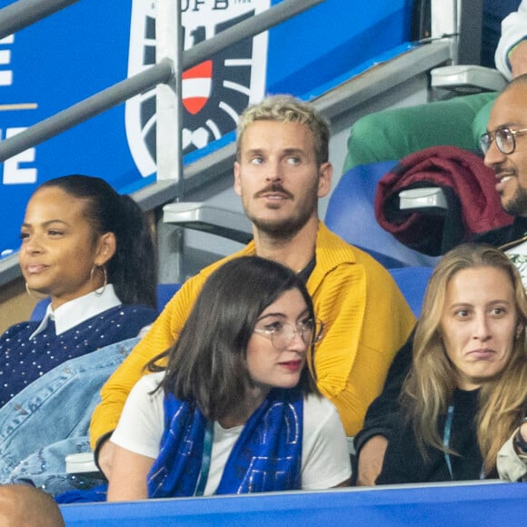 M. Pokora et sa femme Christina Milian - 5e et avant-dernière journée de la Ligue des nations entre la France et l'Autriche au Stade de France à Saint-Denis. Le 22 septembre 2022.