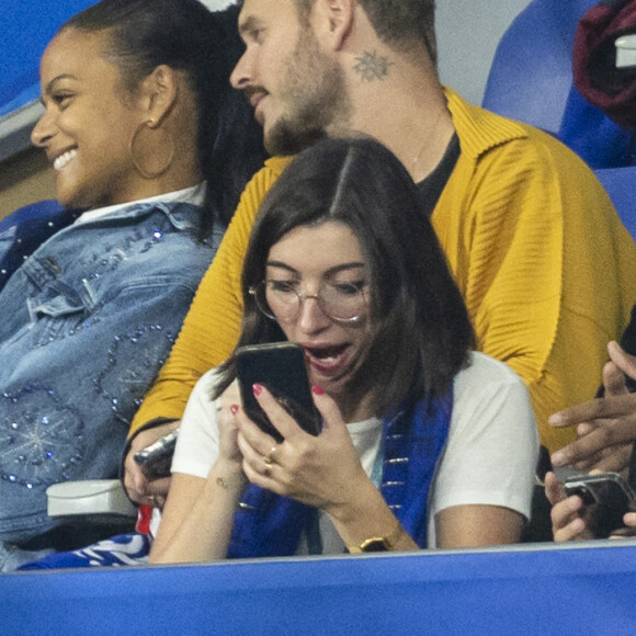 M. Pokora et sa femme Christina Milian - 5e et avant-dernière journée de la Ligue des nations entre la France et l'Autriche au Stade de France à Saint-Denis. Le 22 septembre 2022.