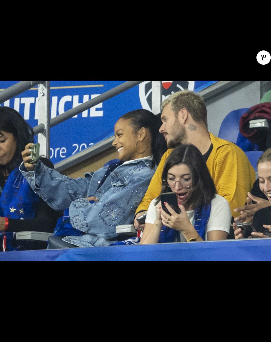 M. Pokora et sa femme Christina Milian - 5e et avant-dernière journée de la Ligue des nations entre la France et l'Autriche au Stade de France à Saint-Denis. Le 22 septembre 2022.