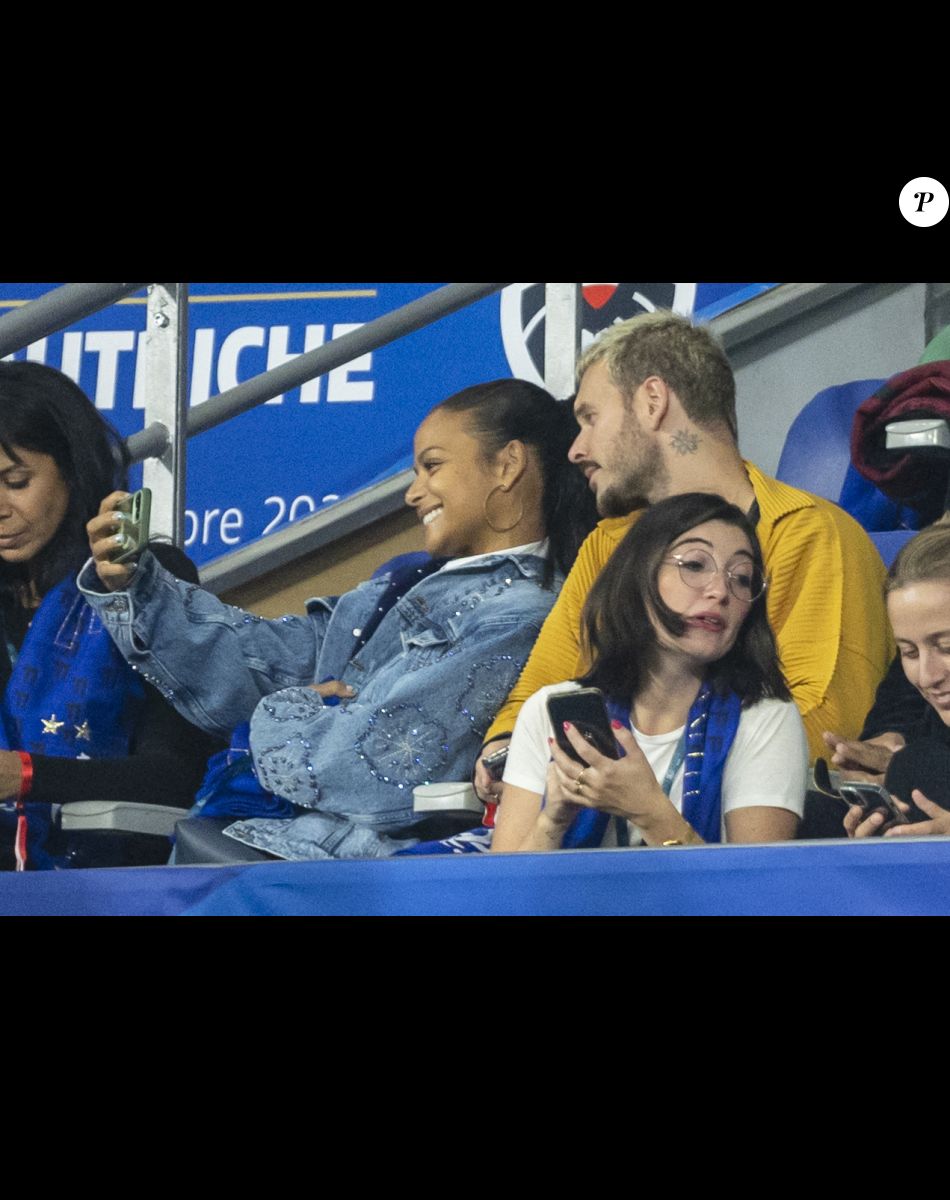 M. Pokora et sa femme Christina Milian - 5e et avant-dernière journée de la Ligue des nations entre la France et l'Autriche au Stade de France à Saint-Denis. Le 22 septembre 2022.