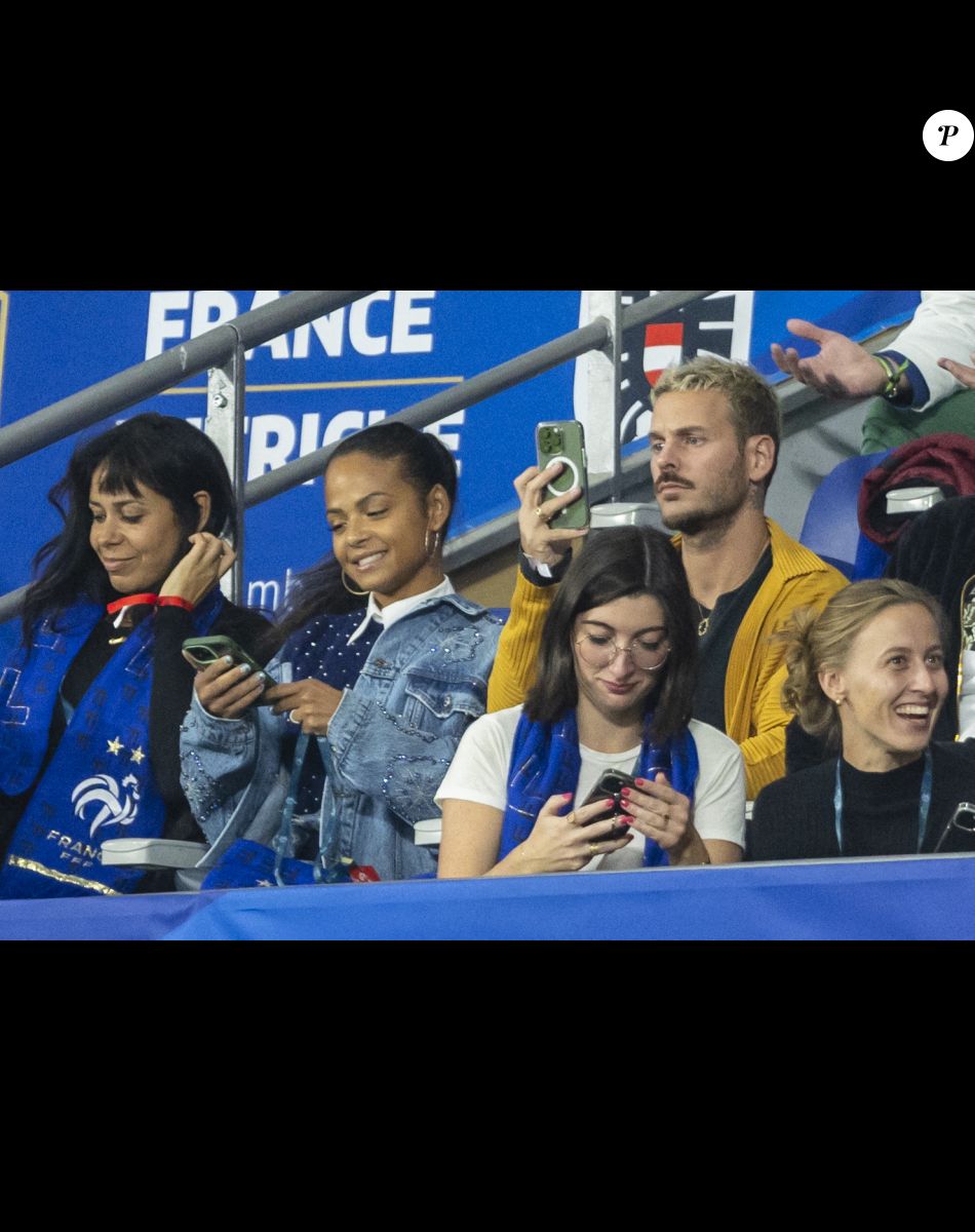 M. Pokora et sa femme Christina Milian - 5e et avant-dernière journée de la Ligue des nations entre la France et l'Autriche au Stade de France à Saint-Denis. Le 22 septembre 2022.