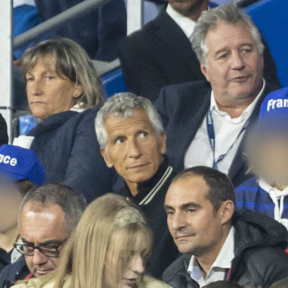 Nagui avec ses enfants Adrien, Roxane, Annabelle - People dans les tribunes lors du match de la 5ème et avant-dernière journée de Ligue des nations entre la France et l'Autriche (2-0) au Stade de France à Saint-Denis le 22 septembre 2022.