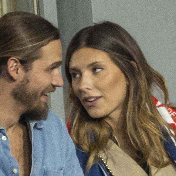 Camille Cerf (Miss France 2015) et son compagnon Théo Fleury - People dans les tribunes lors du match de la 5ème et avant-dernière journée de Ligue des nations entre la France et l'Autriche (2-0) au Stade de France à Saint-Denis le 22 septembre 2022.