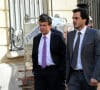 Manuel Valls et Harod Hauzy quittant les locaux d'Europe 1 en 2012