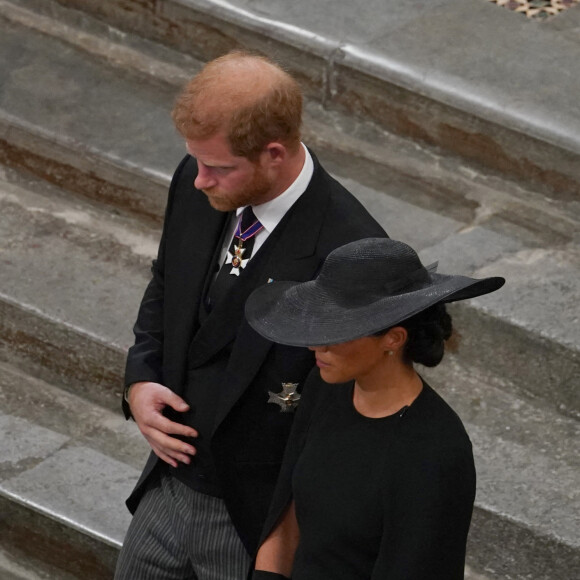 Le prince Harry, duc de Sussex et Meghan Markle, duchesse de Sussex - Service funéraire à l'Abbaye de Westminster pour les funérailles d'Etat de la reine Elizabeth II d'Angleterre. Le sermon est délivré par l'archevêque de Canterbury Justin Welby (chef spirituel de l'Eglise anglicane) au côté du doyen de Westminster David Hoyle. Londres, le 19 septembre 2022. © Gareth Fuller / Bestimage 