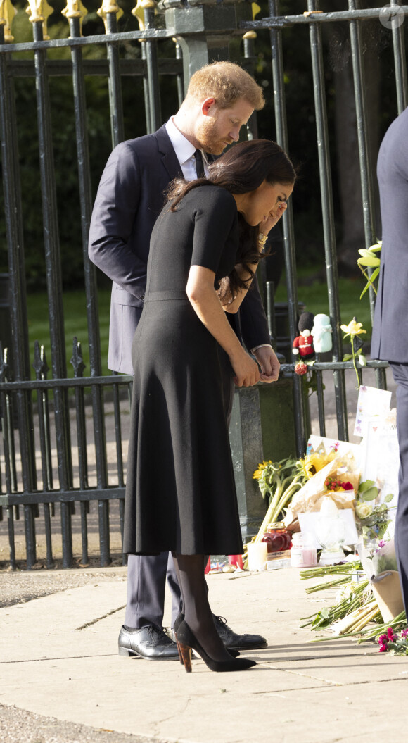 Le prince Harry, duc de Sussex, Meghan Markle, duchesse de Sussex devant le château de Windsor, suite au décès de la reine Elisabeth II d'Angleterre. Le 10 septembre 2022