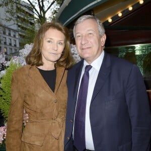 Cécilia Attias et son mari Richard Attias assistent à la soirée du prix de la Closerie des Lilas 2014 à Paris, le 8 avril 2014.