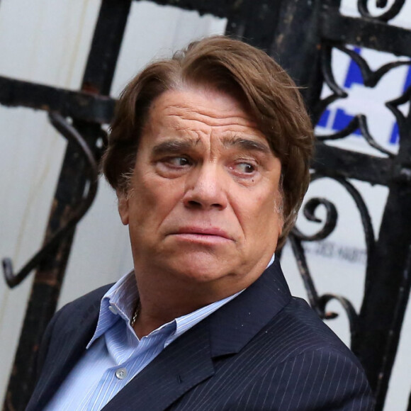 Bernard Tapie aux obsèques de Thierry Roland à la basilique Sainte Clotilde à Paris en 2012