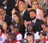 Olivier Giroud et sa femme Jennifer lors du défilé militaire du 14 juillet 2022 place de la Concorde à Paris. © Lionel Urman / Panoramic / Bestimage