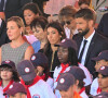 Olivier Giroud et sa femme Jennifer lors du défilé militaire du 14 juillet 2022 place de la Concorde à Paris. © Lionel Urman / Panoramic / Bestimage