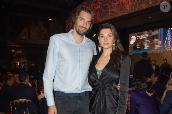 Camille Lacourt et sa compagne Alice Detollenaere - Soirée de gala de l'Institut Rafaël au Pavillon Gabriel à Paris, le 13 décembre 2021. © Erez Lichtfeld / Bestimage