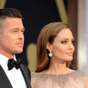 Brad Pitt et Angelina Jolie - Pressroom - 86ème cérémonie des Oscars à Hollywood, le 2 mars 2014. 