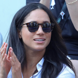 Première apparition officielle du prince Harry et sa compagne Meghan Markle dans les tribunes de la finale de tennis à la troisième édition des Invictus Games à Toronto, Ontario, Canada, le 25 septembre 2017. 