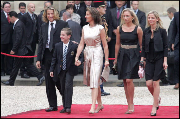 Pierre Sarkozy, Louis Sarkozy, Cécilia, Jeanne-Marie et Judith Martin, à l'Elysée