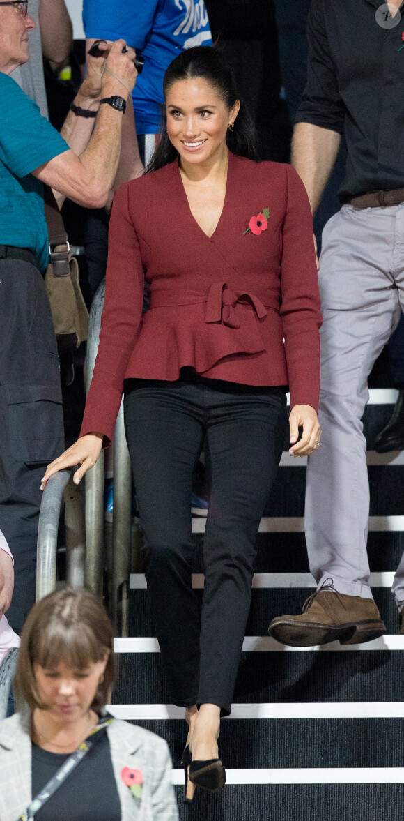 Meghan Markle, duchesse de Sussex, enceinte, assiste à la cérémonie de clôture des Invictus Games 2018 à Sydney, le 27 octobre 2018. 