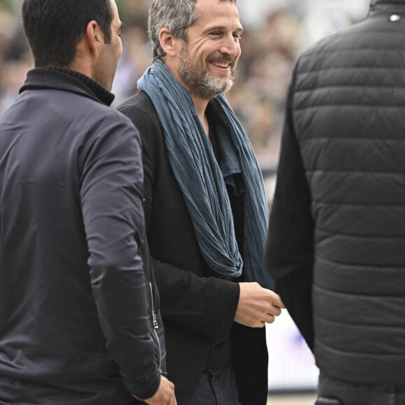 Guillaume Canet lors de la 8e édition du "Longines Paris Eiffel Jumping" au Champ de Mars à Paris, le 25 juin 2022.