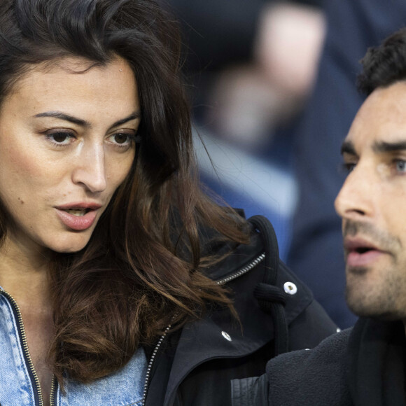 Rachel Legrain-Trapani et son compagnon Valentin Léonard - People dans les tribunes du match PSG Vs Lorient (5-1) au Parc des Princes à Paris. © Agence/Bestimage