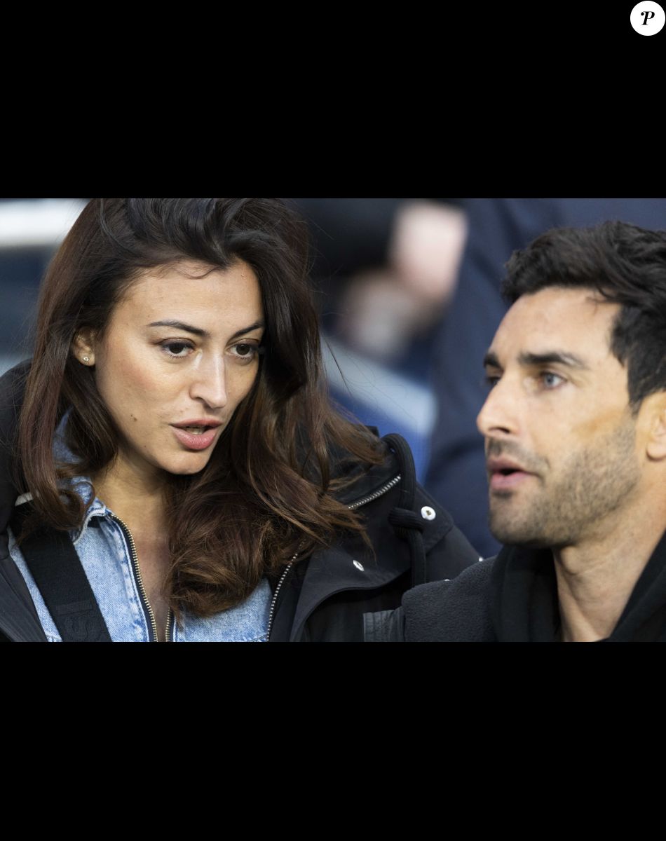 Rachel Legrain-Trapani et son compagnon Valentin Léonard - People dans les tribunes du match PSG Vs Lorient (5-1) au Parc des Princes à Paris. © Agence/Bestimage