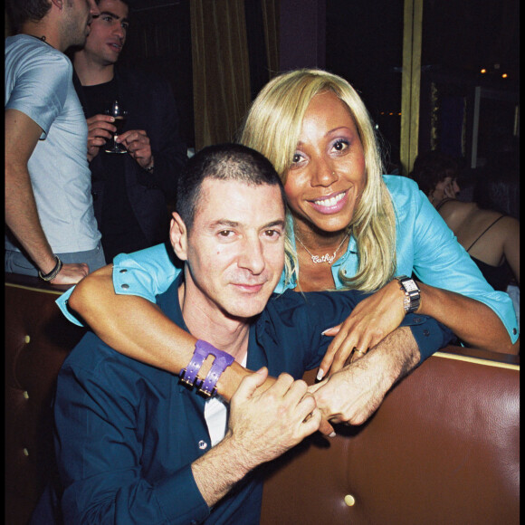 Archives - Etienne Daho et Cathy Guetta lors de l'anniversaire de Jean Yves Bouvier aux Bains douches à Paris.