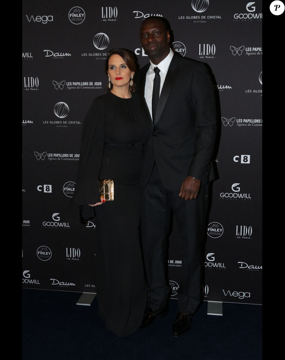 Omar Sy et sa femme Hélène au photocall de la 11ème cérémonie des Globes de Cristal au Lido à Paris le 30 janvier 2017. © CVS / Bestimage