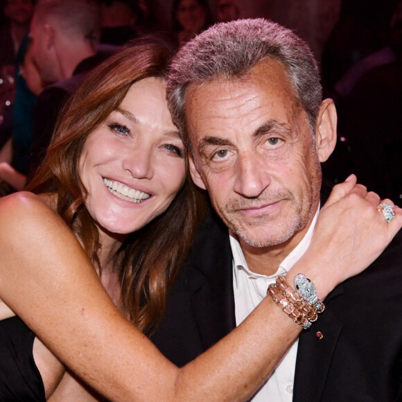 Carla Bruni-Sarkozy et son mari Nicolas Sarkozy - 19ème "Diner de la Mode" au bénéfice de Sidaction au Pavillon Cambon Capucines dans le cadre de la Fashion Week de Paris, France. © Rachid Bellak / Bestimage 