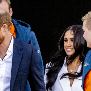 Le prince Harry, duc de Sussex, et Meghan Markle, duchesse de Sussex assistent à un engagement à la veille des Jeux Invictus 2020 aux Pays-Bas, à La Haye, le 15 avril 2022. 