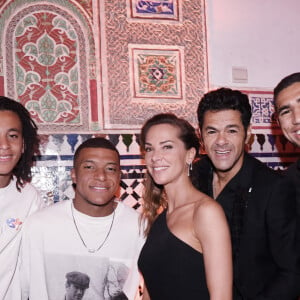 Exclusif - Kylian Mbappé, son frère Ethan (à droite), Mélissa Theuriau, son mari Jamel Debbouze et Achraf Hakimi à l'after-party de la soirée du grand gala du "Marrakech du Rire 2022" pour la 10ème édition à l'hôtel Selman de Marrakech, Maroc, le 18 juin 2022. © Rachid Bellak/Bestimage