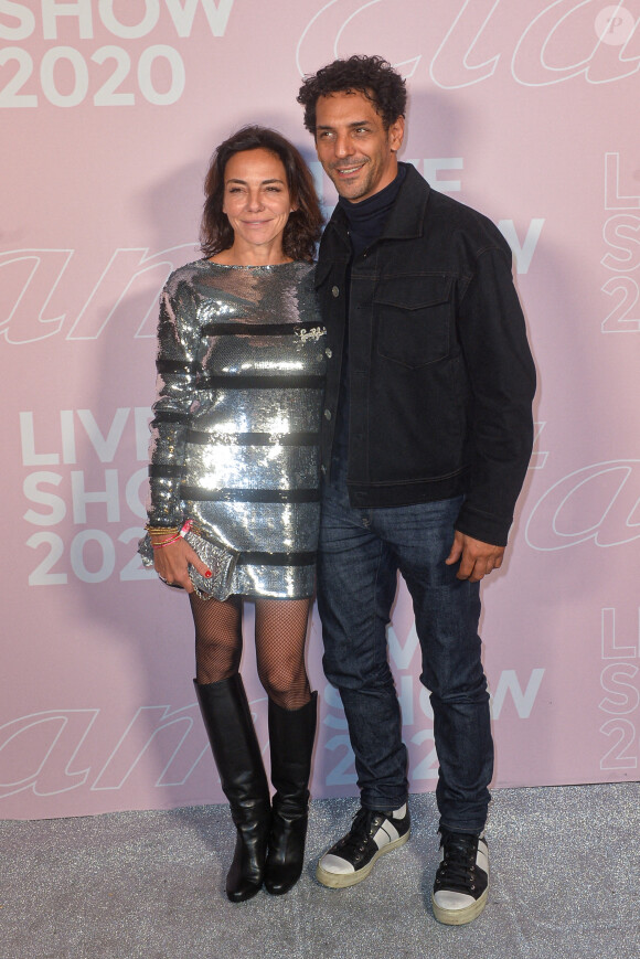 Sandra Sisley et Tomer Sisley - Photocall du défilé Etam Live Show 2020 à Paris le 29 septembre 2020. © Pool Agence Bestimage 