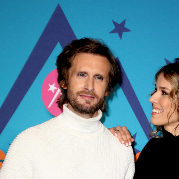 Philippe Lacheau et Elodie Fontan au photocall de la soirée d'ouverture de la 25ème édition du Festival international du film de comédie de l'Alpe d'Huez le 17 janvier 2022. © Dominique Jacovides / Bestimage