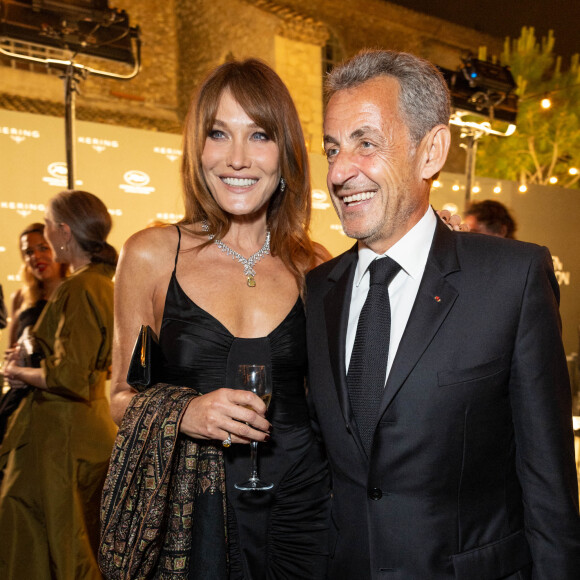 Carla Bruni et son mari Nicolas Sarkozy - Personnalités à la soirée "Women In Motion" par Kering au Château de la Castre lors du 75ème Festival International du Film de Cannes. Le 22 mai 2022 © Olivier Borde / Bestimage 