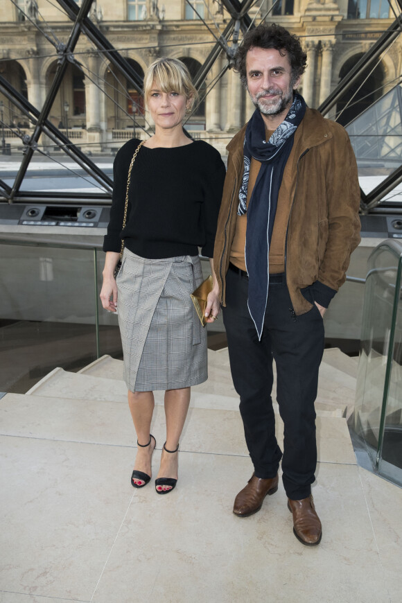 Marina Foïs et Eric Lartigau au défilé de mode "Louis Vuitton", collection prêt-à-porter Automne-Hiver 2017-2018 au musée du Louvre à Paris, le 7 Mars 2017.© Olivier Borde/Bestimage 